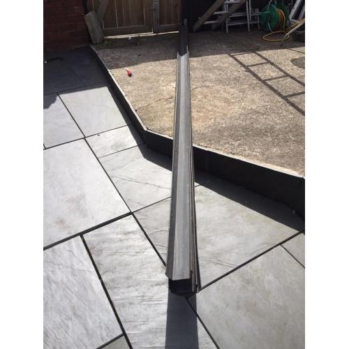 Black gutters and rainwater pipe