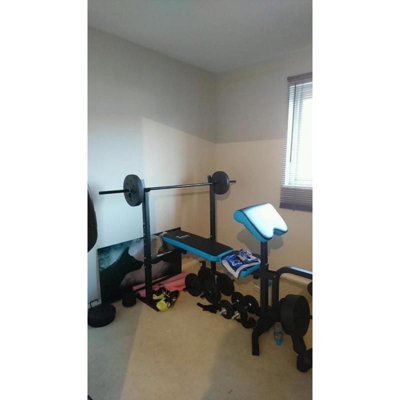Weight bench with leg extension (35kg weights) and pull up bar