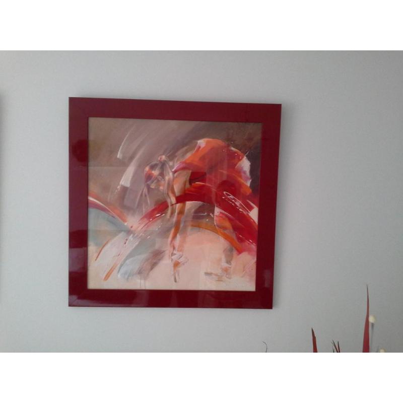 2 ballerina pictures for sale with red high gloss finish frames which are 2 foot 8 inch square