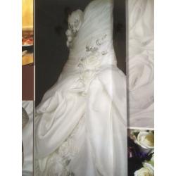 Beautiful size 10 wedding dress with storage box