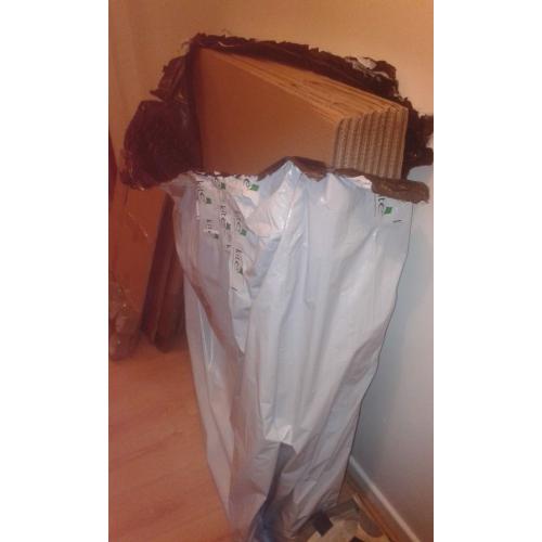 new and used cardboard boxes and new washing machine liquid