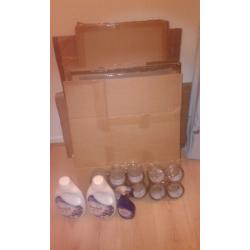 new and used cardboard boxes and new washing machine liquid