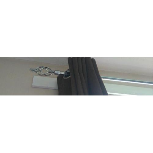Silver extending curtain pole with matching tie backs
