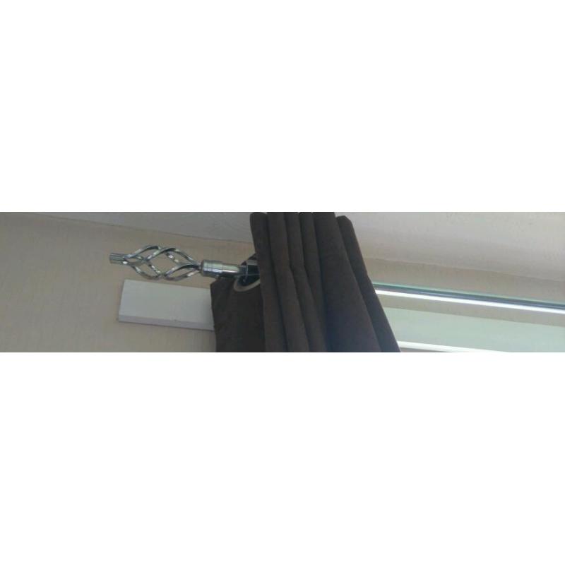 Silver extending curtain pole with matching tie backs