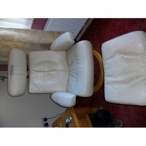 cream leather stress recliner chair with stool.