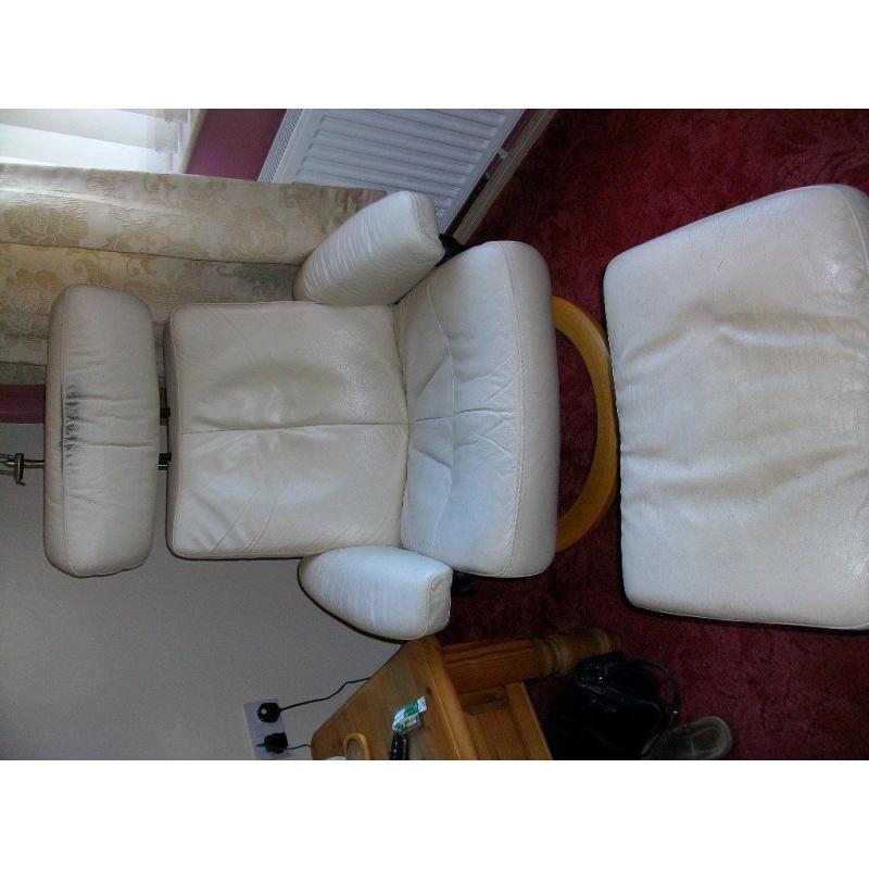 cream leather stress recliner chair with stool.