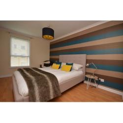 Designer Kingsize Bed with Button Back Upholstered Headboard
