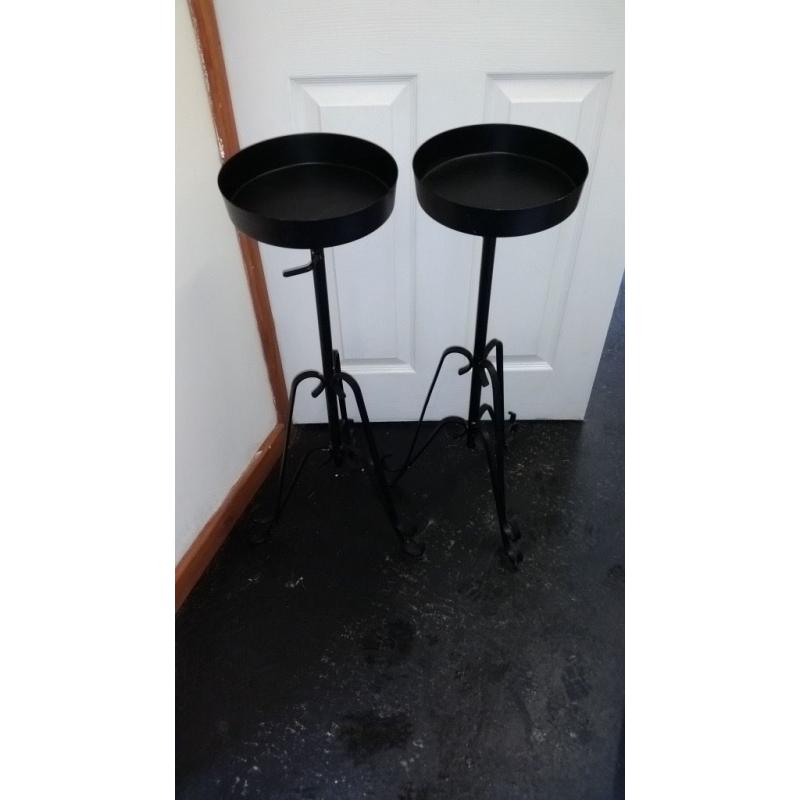 black metal pedestal stands for weddings or events