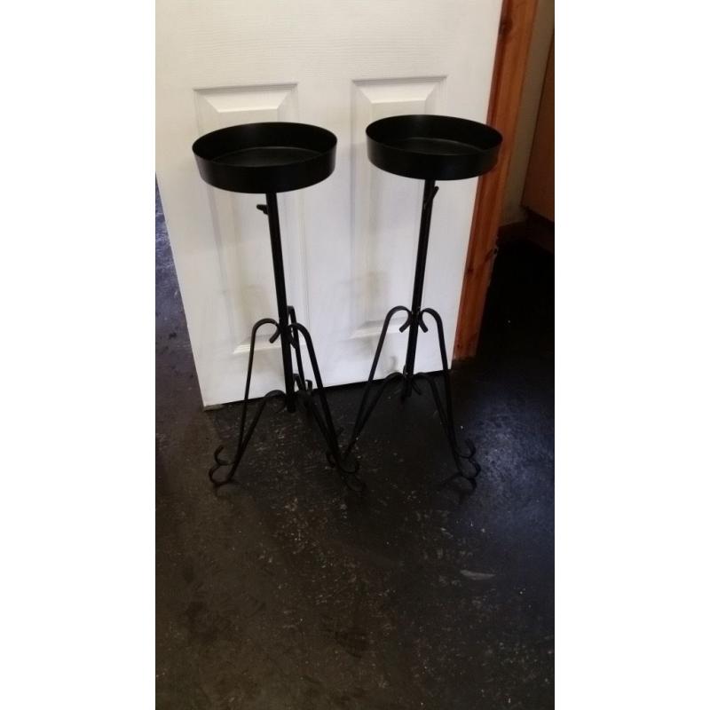 black metal pedestal stands for weddings or events