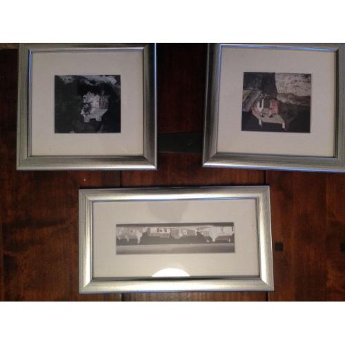 A collection of framed photos