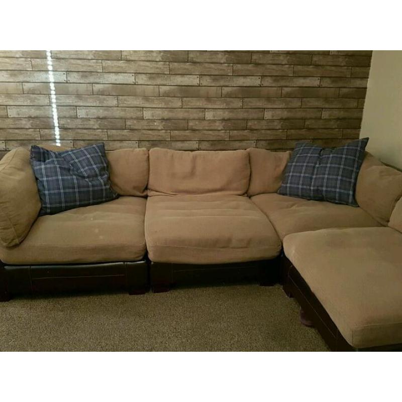 Free to uplift corner couch and pouffe