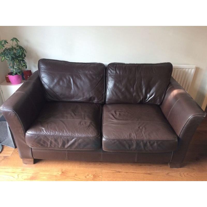 Brown genuine leather two seater sofa. X2