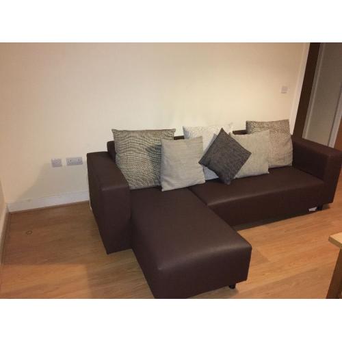 Brown corner sofa