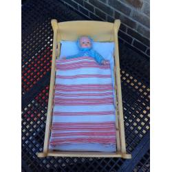Wooden toy rocking crib