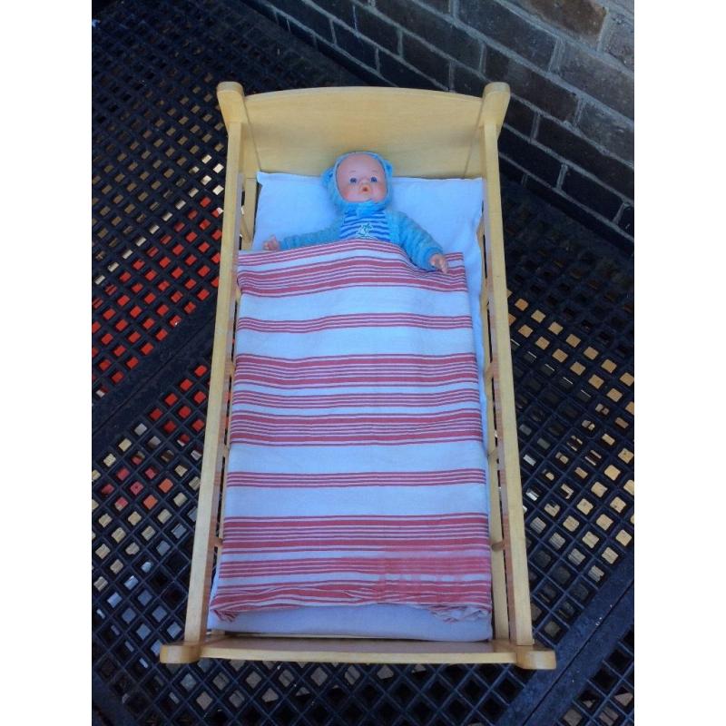 Wooden toy rocking crib