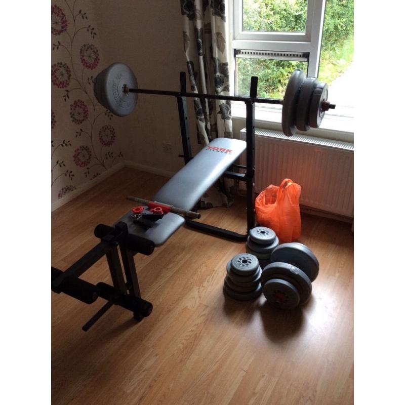 York weight bench with bar amd loads of weights