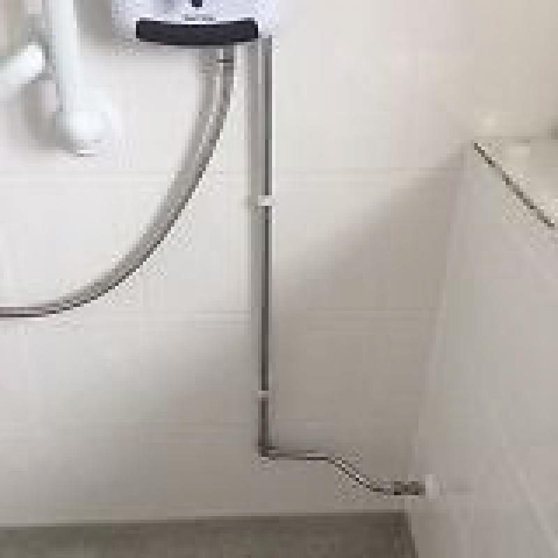 Electric shower, white Triton including overhead shower head and hose. Excellent condition.