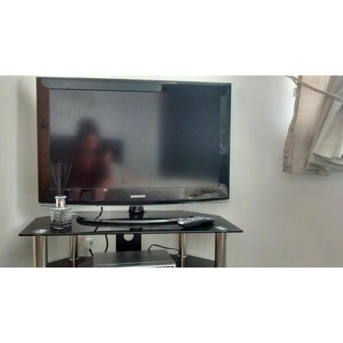 TV stand 40" TV DVD player and sky box