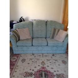 3 seater sofa, two chairs and a foot stool with storage