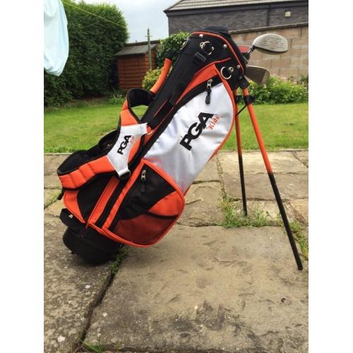 Junior golf clubs and bag