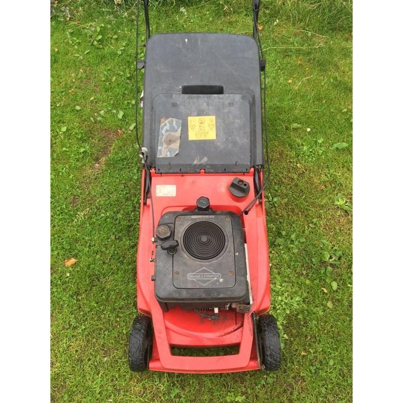 Mtd Briggs and Stratton roller mower.