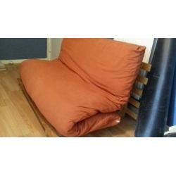 Orange futon for sale
