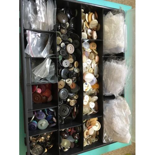 Buttons and assorted packets of lace