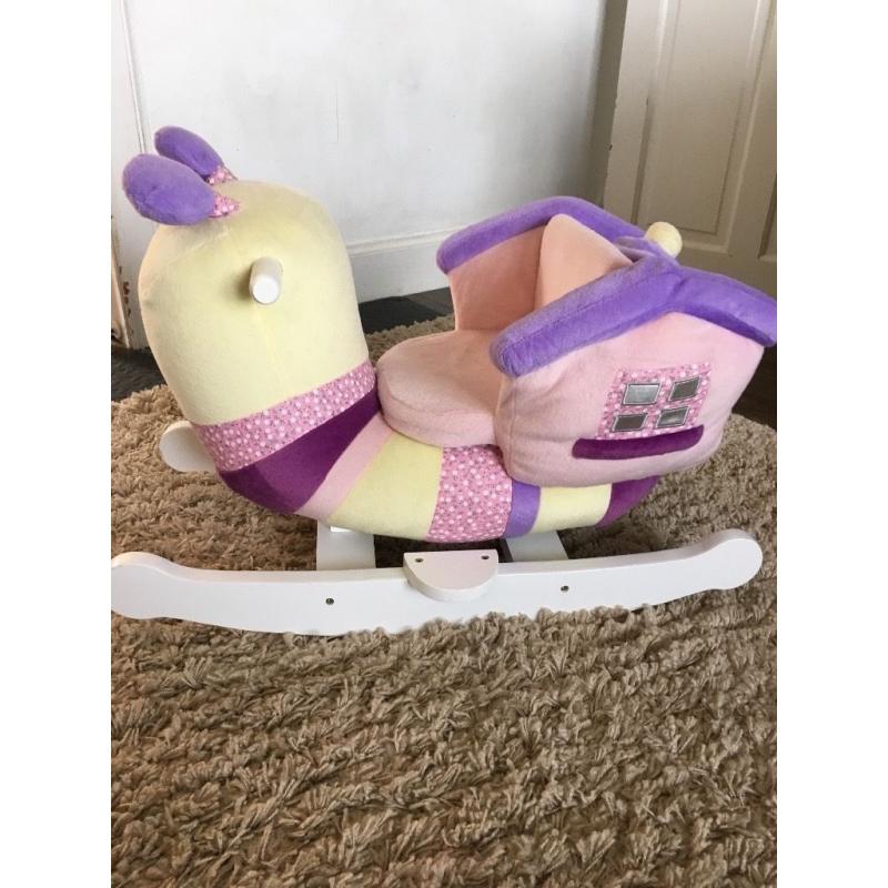 Girls rocking snail