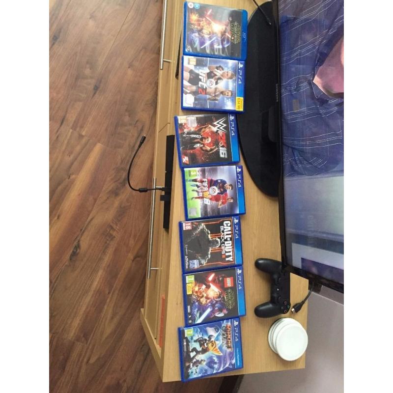 PS4 1TB console, controller, wireless headset and games for sale