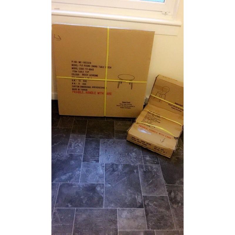 Dining table and 4 chairs brand new