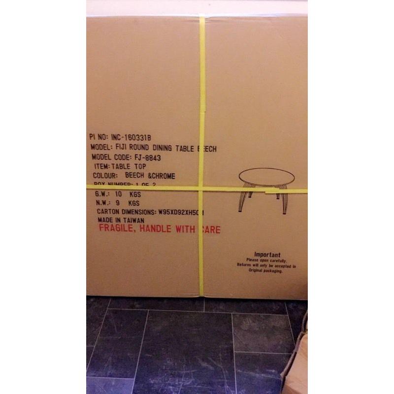 Dining table and 4 chairs brand new