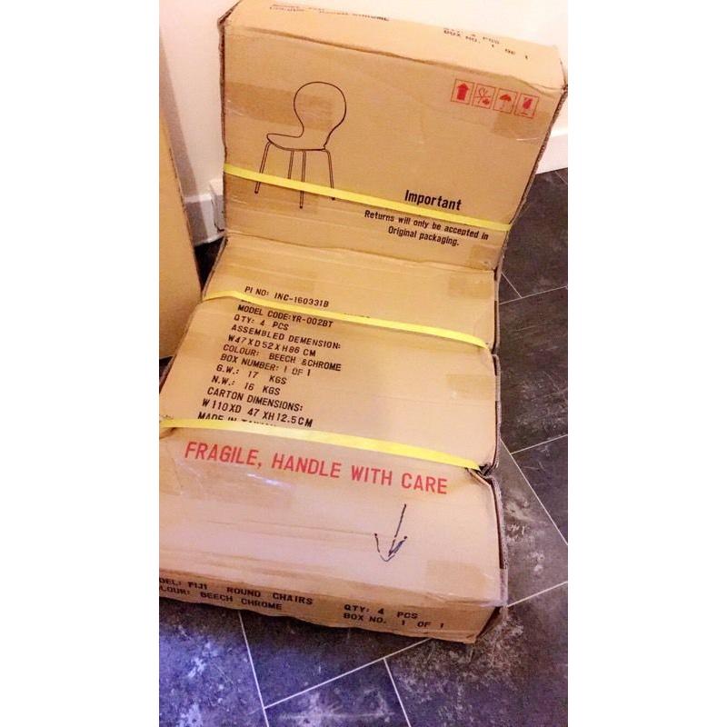 Dining table and 4 chairs brand new