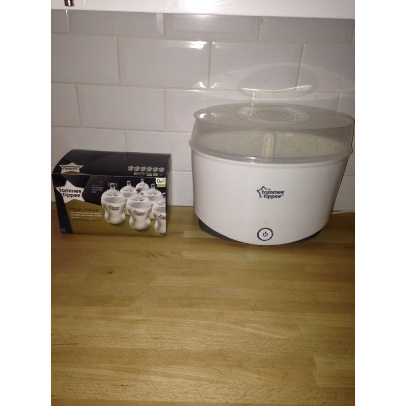 Tommee tippee electric steriliser + brand new bottles