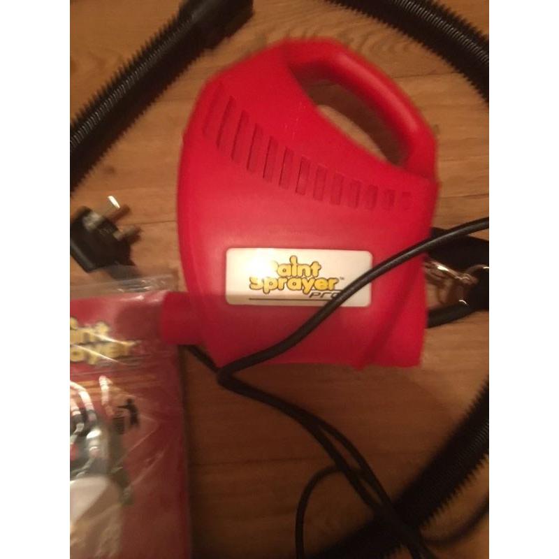 Paint sprayer and garden trolley