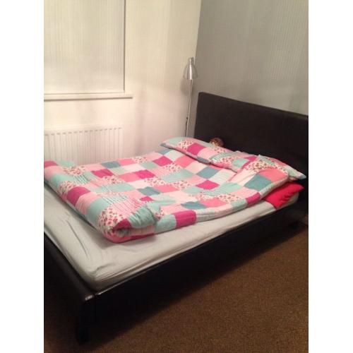 Faux leather double bed