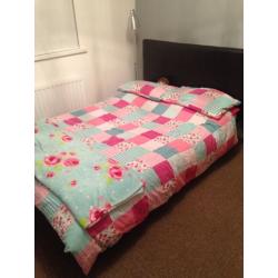 Faux leather double bed