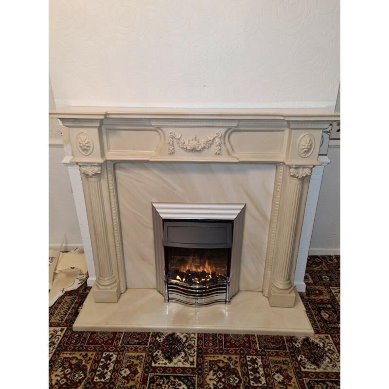 marble fireplace with electric fire