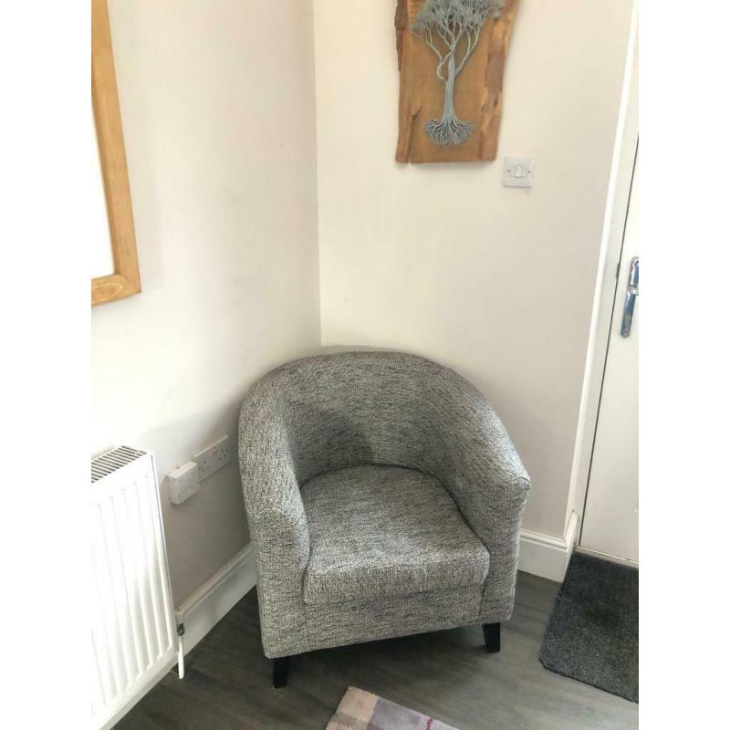 Reupholstered tub chair