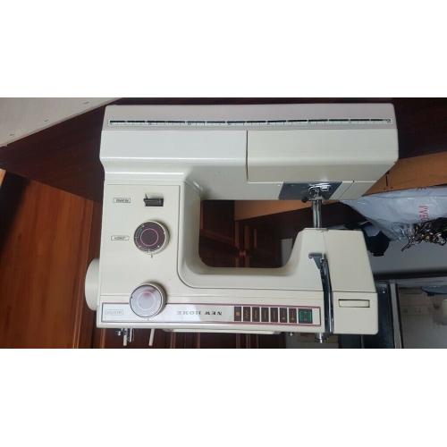 New home cream colour sewing machine ?40