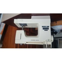 New home cream colour sewing machine ?40