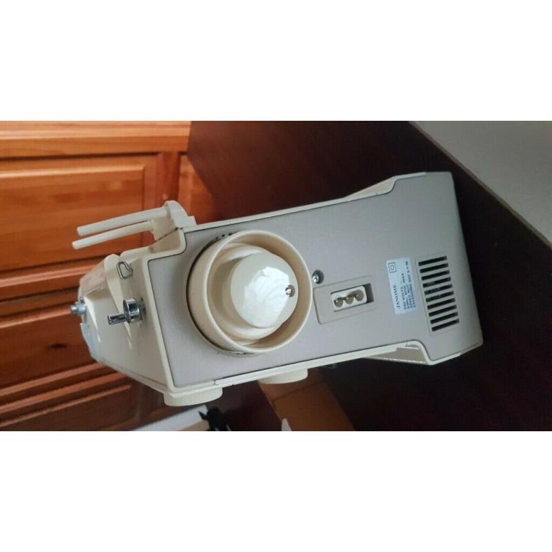 New home cream colour sewing machine ?40