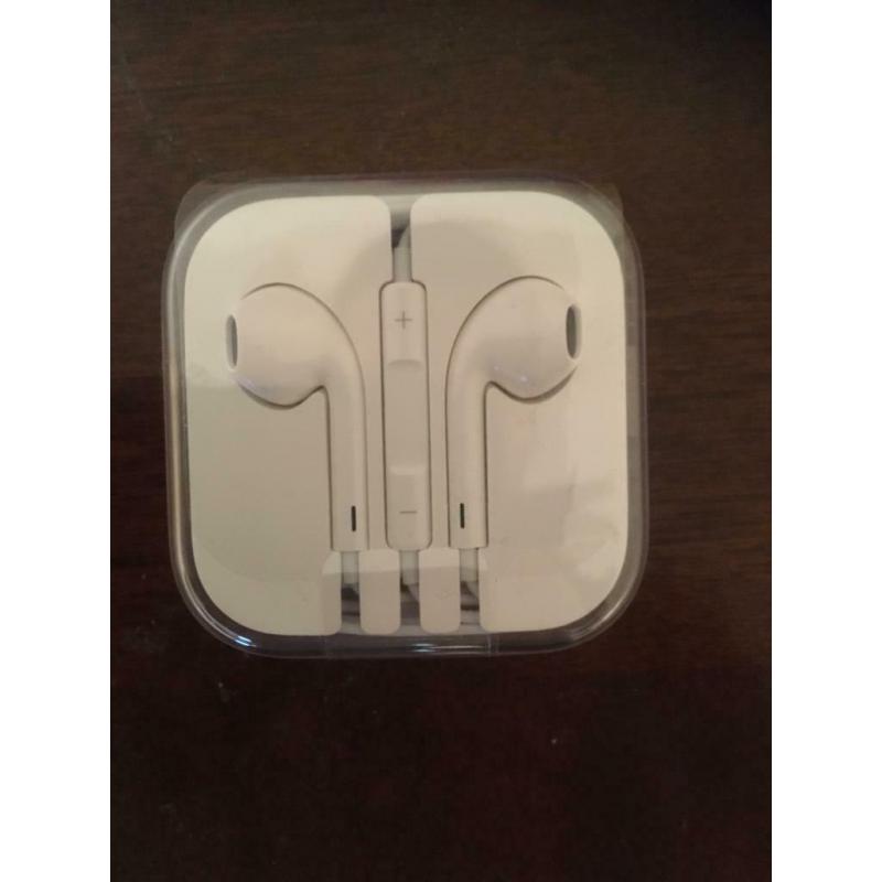 Apple earphones, unopened and boxed, aux connection.