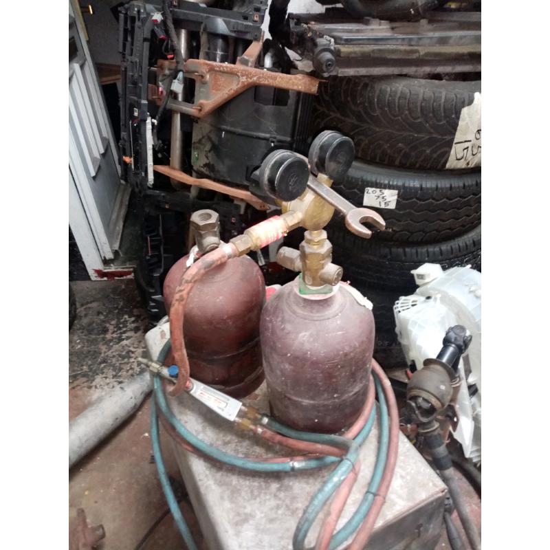 TWO SETS OF GAS BOTTLES