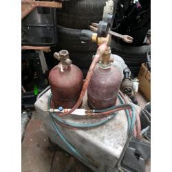 TWO SETS OF GAS BOTTLES