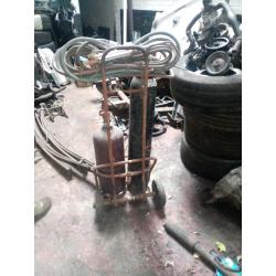 TWO SETS OF GAS BOTTLES