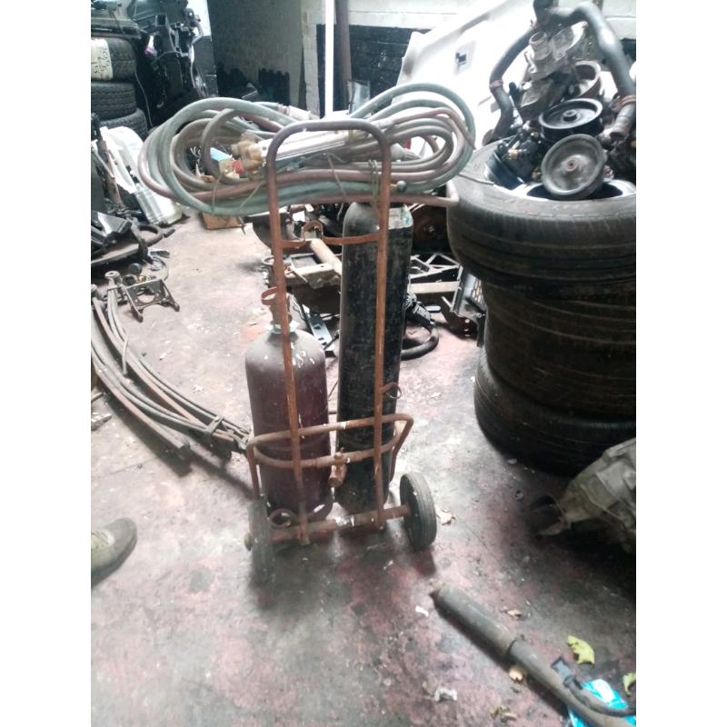 TWO SETS OF GAS BOTTLES