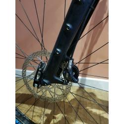 Trek stache 7. Medium frame fitted with 1120 carbon fork and rack