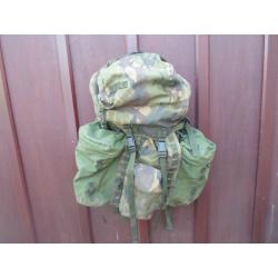 Rucksack and frame long convoluted back zipped on pockets with lots of other pockets can post out