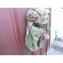 Rucksack and frame long convoluted back zipped on pockets with lots of other pockets can post out