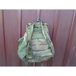 Rucksack and frame long convoluted back zipped on pockets with lots of other pockets can post out